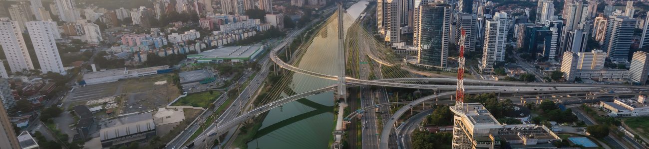 Aerial view of Octavio Frias de Oliveira Bridge (Ponte Estaiada) over Pinheiros River at sunset - Sao Paulo, Brazil
